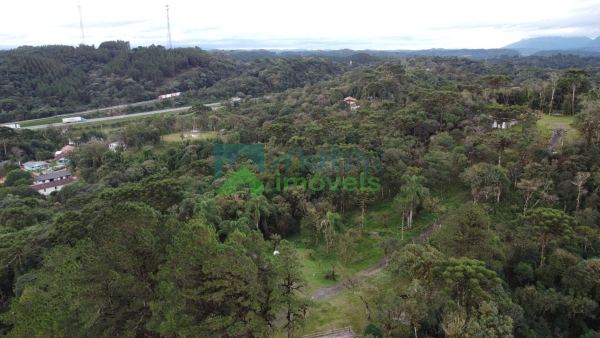 Terreno de 1830 metros com pequena casa próximo ao Portal da G...